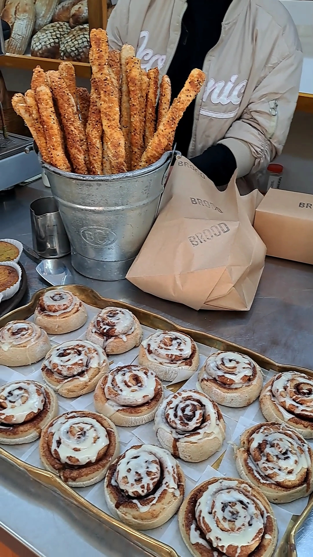 Glazed cinnamon rolls and breadsticks at BROOD's counter